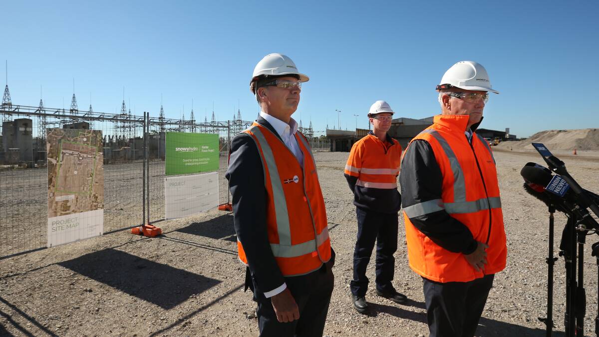 Paul Broad, at the microphone, with former Coalition energy minister Angus Taylor at the Kurri Kurri gas turbine site in May 2021. Picture by Simone De Peak
