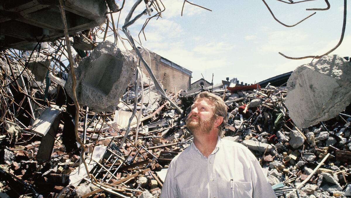 AFTERMATH: Workers club secretary manager Wayne Dean surveys what remains 11 days after the quake on Sunday, January 8, 1990. Picture: David Wicks