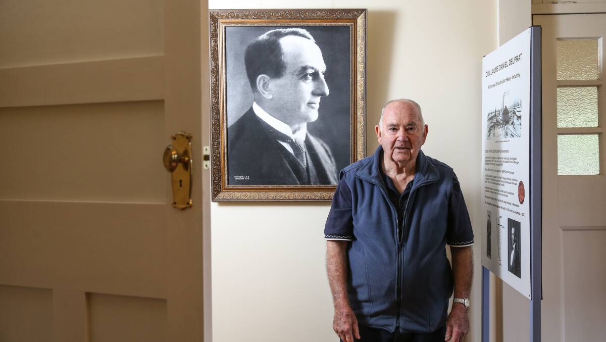 HAPPILY RETIRED: Heritage association member 'Oxy' Bob Lee, former BHP employee and contractor, with a portrait of GD Delprat. Picture: Marina Neil