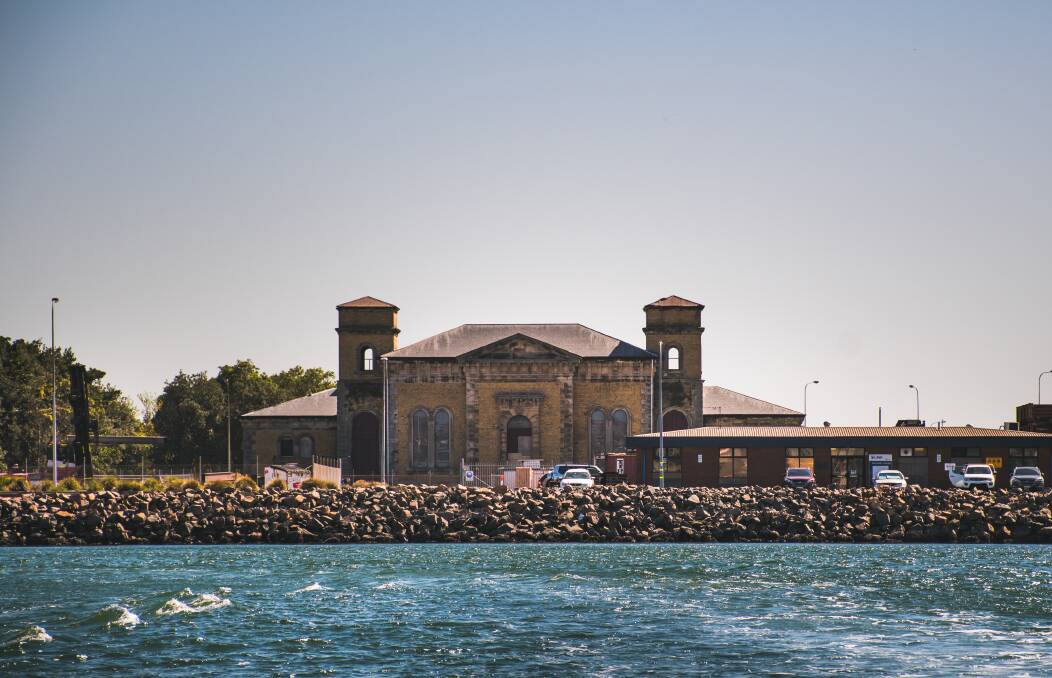 BIT OLD FOR OFFICES: Carrington's heritage-listed pump house, sitting in the centre of the Basin between its east and west wharves. Picture: Simon McCarthy