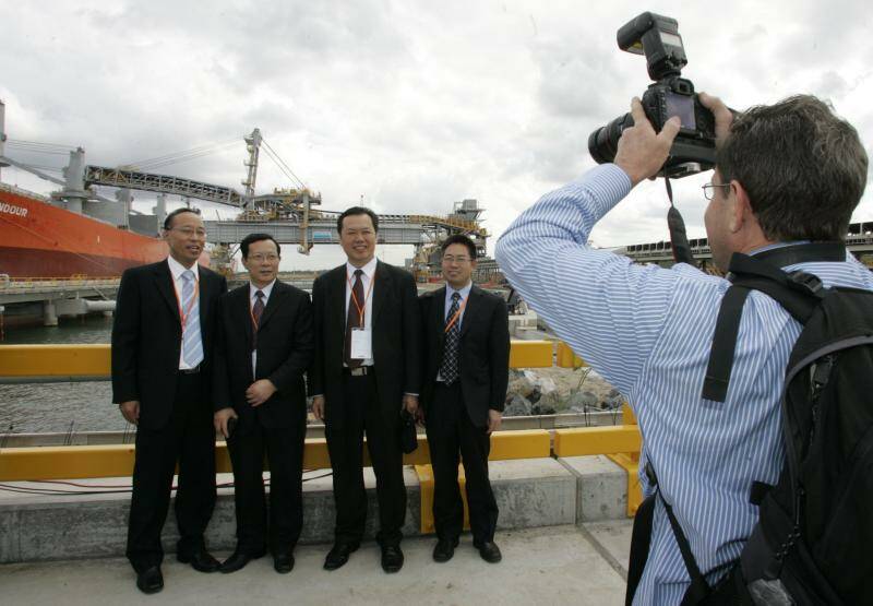 NEW ERA: Management from Yancoal's parent company Yanzhou at the opening of Newcastle's NCIG coal loader on Kooragang Island in 2010. 