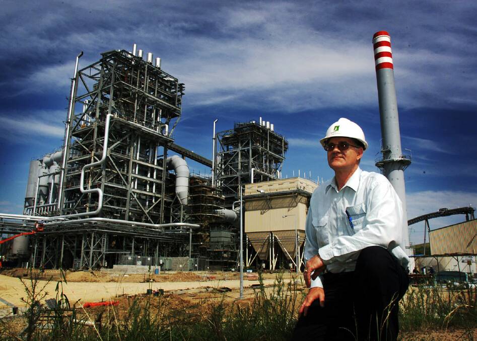 Redbank power station pictured in 2001 with then general manager Sam Barber.