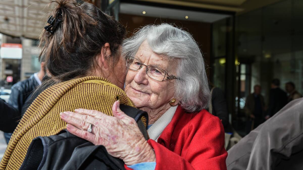 Audrey Nash hugging the Newcastle Herald's Joanne McCarthy outside a court in Sydney last year.
