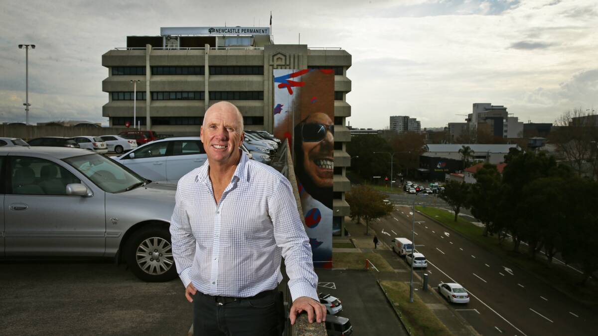 Businessman Darren Nicholson on top of his King Street, Newcastle, carpark in 2016, says his proposals for Catherine Hill Bay would be good for the town. Picture: Marina Neil