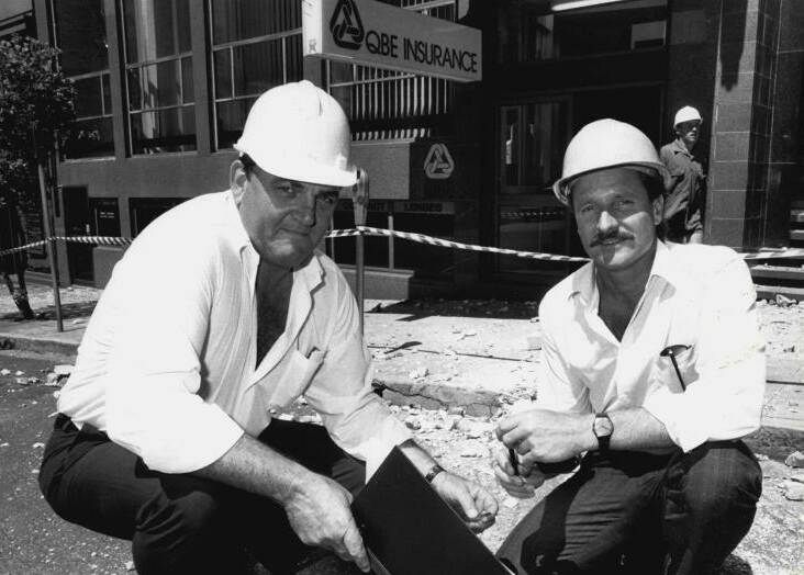 Building consultant Ian Frew and his colleague Peter Clark assessing earthquake damage on New Year's Day 1990, the Monday after the earthquake 