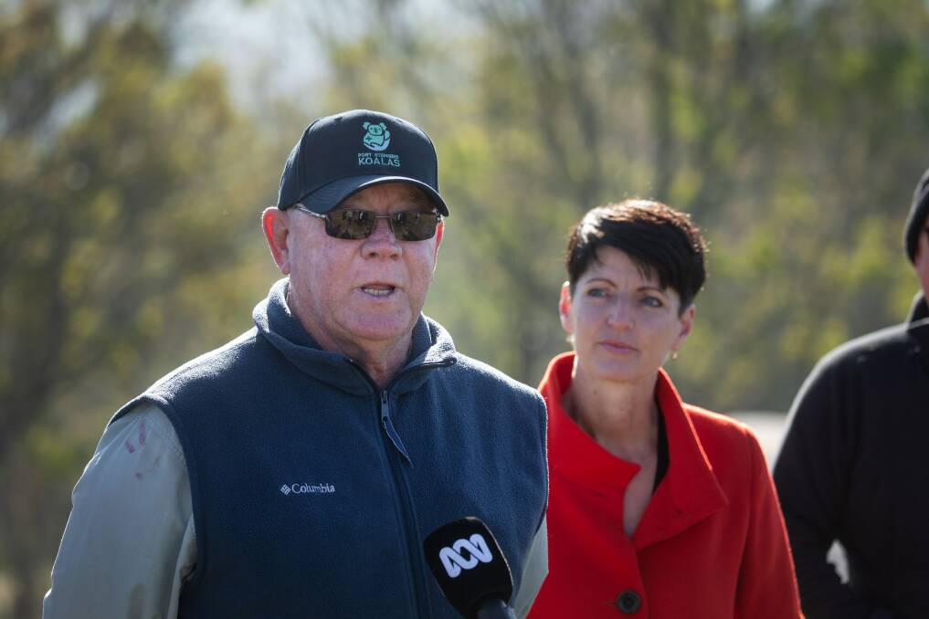 BEARING DOWN: Port Stephens Koalas president Ron Land with state MP Kate Washington speaking against a Brandy Hill quarry last year. Picture: Marina Neil