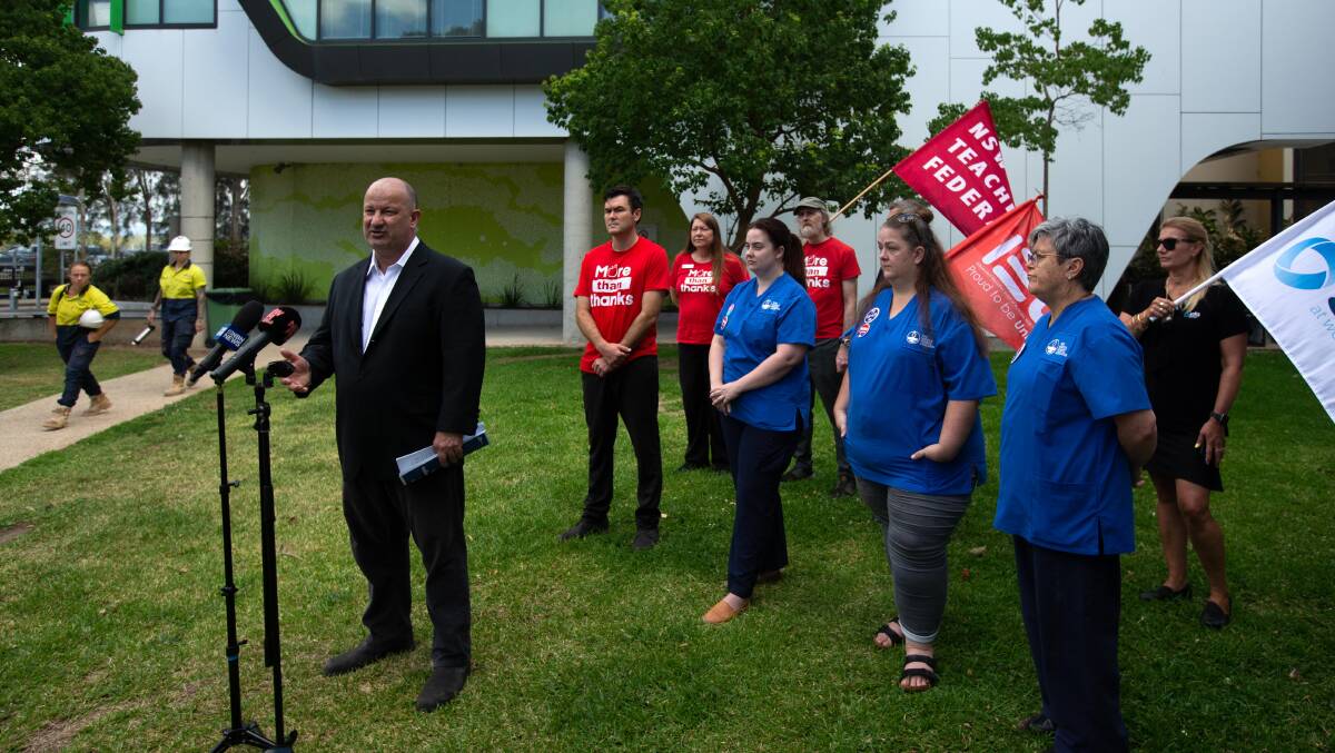 Unions NSW secretary Mark Morey at John Hunter Hospital yesterday with union representatives launching the 'labour shortages' report commissioned by Unions NSW by David Peetz from Griffith University. Pictures by Jonathan Carroll