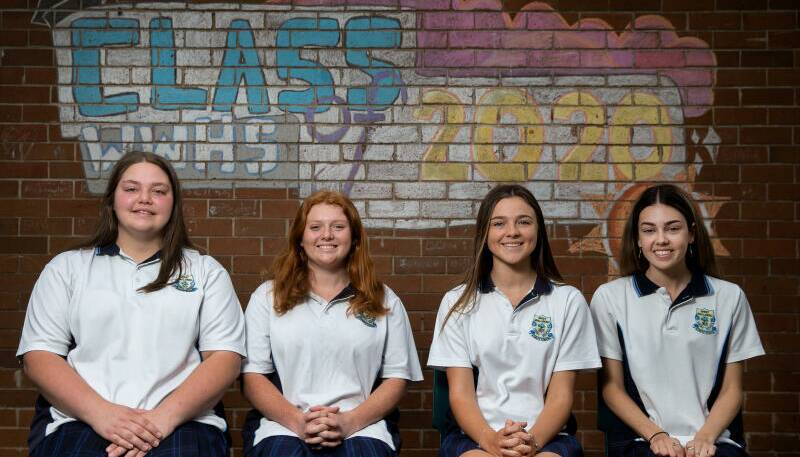 PRE-EXAM SMILES: Let's hope these West Wallsend High students are as happy after their exams as they looked on Friday for this photograph. From left to right, Maddison Reichert, Alyssa Charter-Smith, Teneal Bull and Danica Taylor. Picture: Marina Neil
