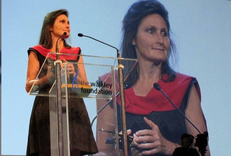 ULTIMATE ACCOLADE: Joanne McCarthy during her acceptance speech after winning Australia's top honour in journalism, the Gold Walkley, for her work on the Shine The Light campaign