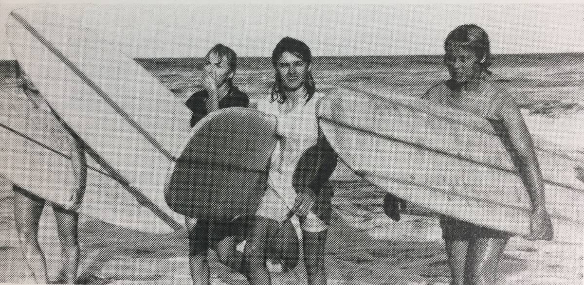 SO YOUNG: Newcastle Herald photograph from the Merewether Surfboard Club history, 1964-1988. Captioned: Nancy Newburn, right, Judy Cornish, and friends.