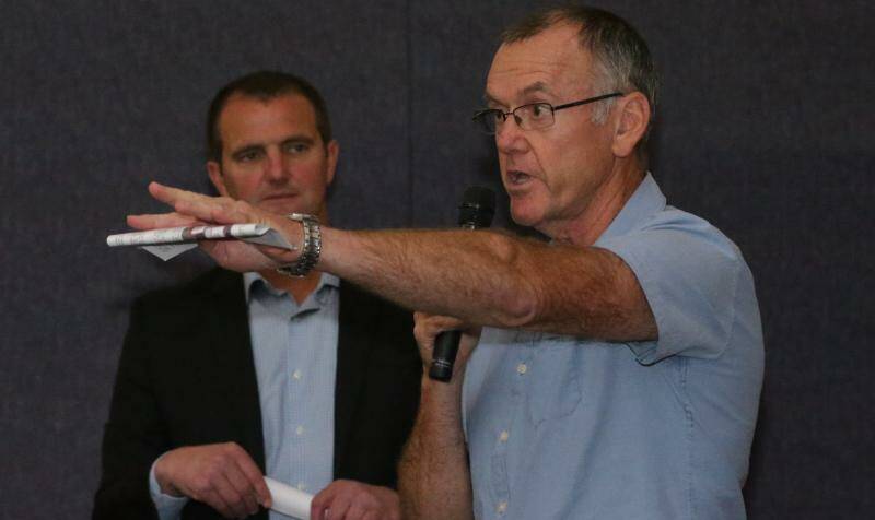 Cessnock Councillor Ian Olsen speaking at a community meeting on the jail's expansion in August 2016, with Cessnock MP Clayton Barr looking on. Picture: Simone De Peak