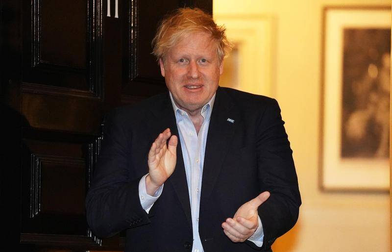 BEEN THERE BUT STILL DOING THAT: UK Prime Minister Boris Johnson at the time the world learned he had been hospitalised with COVID-19. Having initially played 'tough guy' to the virus by ignoring health warnings about shaking hands and refusing to wear a mask, he now admits to his nation's 'disaster'.