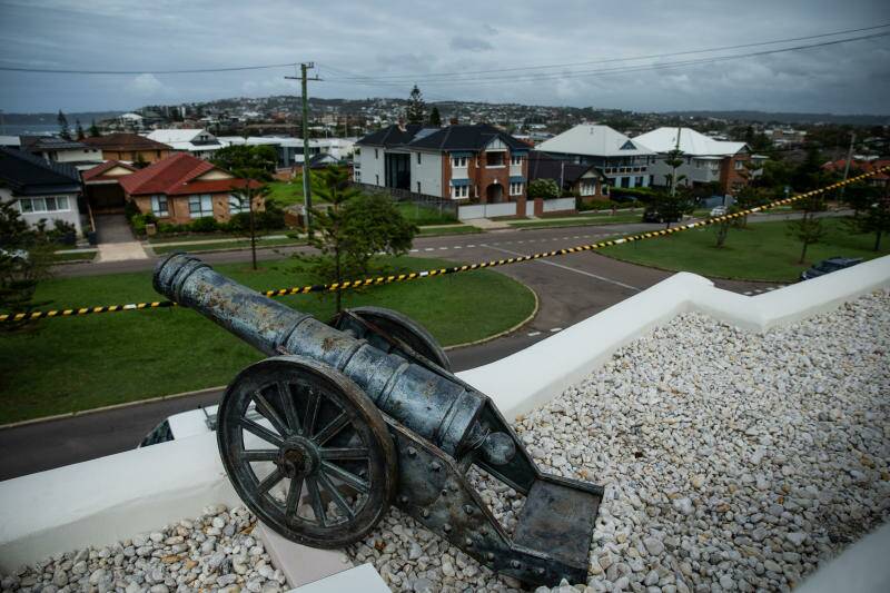 FIRED UP: Intentionally or not, the decorative cannons on the top of the Bar Beach avenue property are an apt symbol, given the controversy the house - and the demolition of the building that stood there previously - has caused. Picture: Marina Neil