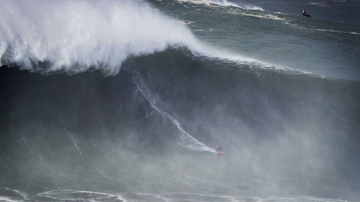 FLY SPECK: Justine Dupont at Nazare, Portugal, 2019. Picture: Damien Poullenot/WSL