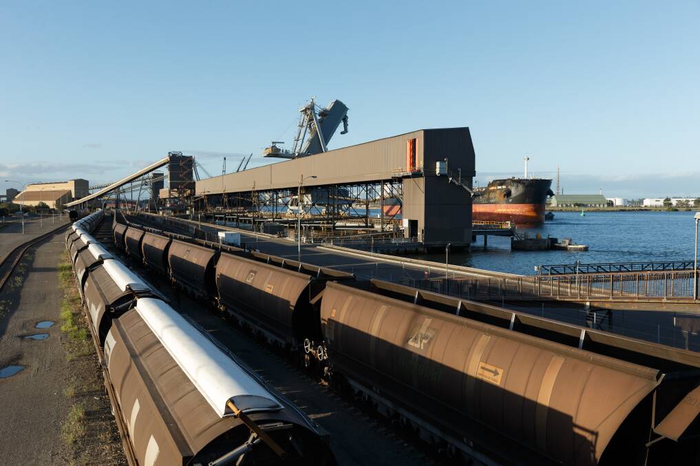 COAL CHAIN: Coal is hauled by rail to the Port of Newcastle and into one of the port's three coal loaders - two on Kooragang Island and this, the smallest of the three, at Carrington. Picture: Max Mason Hubers