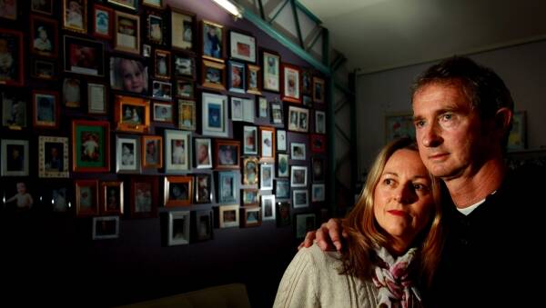THE SADNESS THAT NEVER GOES: Jenny and Mark Richards in 2012, at a time the SIDS centre in Stewart Avenue, Hamilton, was facing funding difficulties. Picture: Simone De Peak