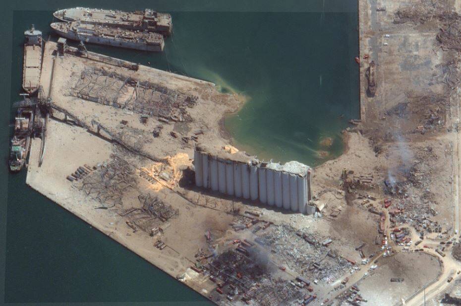 A satellite image of the Beirut blast site, including small ship, on the right hand wharf apron, apparently blown out of the water by the blast. Picture: Courtesy maxar.com