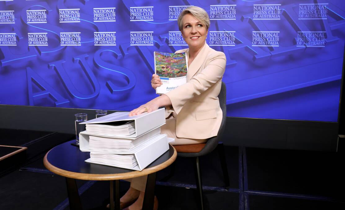  DOOR-STOPPER: Federal Environment Minister Tanya Plibersek at the National Press Club today, with three thick folders containing the contents of the State Of The Environment 2021 report delivered to the Morrison government in December but not released. Picture: James Croucher