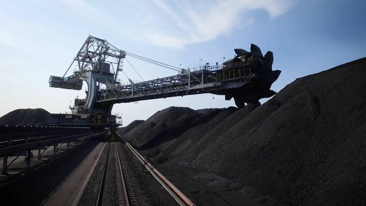 BETTER PRACTICE: NCIG says it is operating its plant more efficiently to gain the extra capacity out of its existing infrastructure, including these coal stacker-reclaimers. Picture: NCIG video