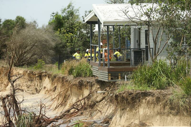 Erosion through Stockton caravan park to the edge of one of the cabins installed less than 10 years ago - well back from the water's edge at the time.
