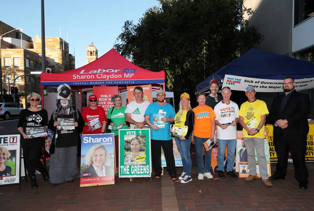 FULL HOUSE: Labor and the Coalition are expected to have the greatest numbers of booth volunteers but the minor parties and Independents have mustered solid support. The King Street, Newcastle, pre-polling station late yesterday. Picture: Peter Lorimer