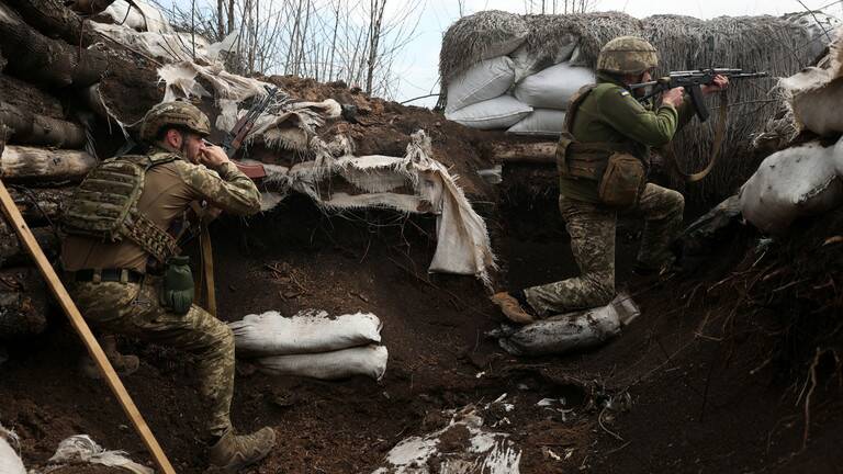 IN THE TRENCHES: Most images we see in the West come from the Ukraine side. This one is of Russian soldiers. Picture: Russia Today