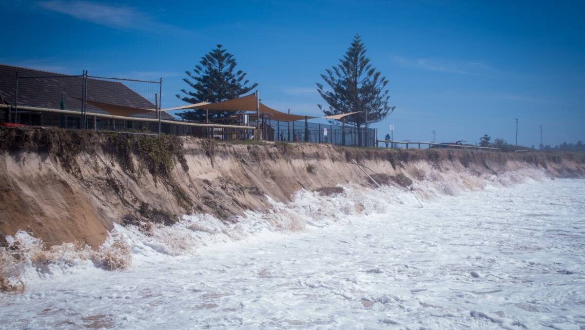 WASHING AWAY: Waves pummel the sand in front of the Mission Australia Stockton Early Learning Centre at Barrie Crescent, Stockton, about 1.5km from the southern end of the beach. Picture: Simon McCarthy