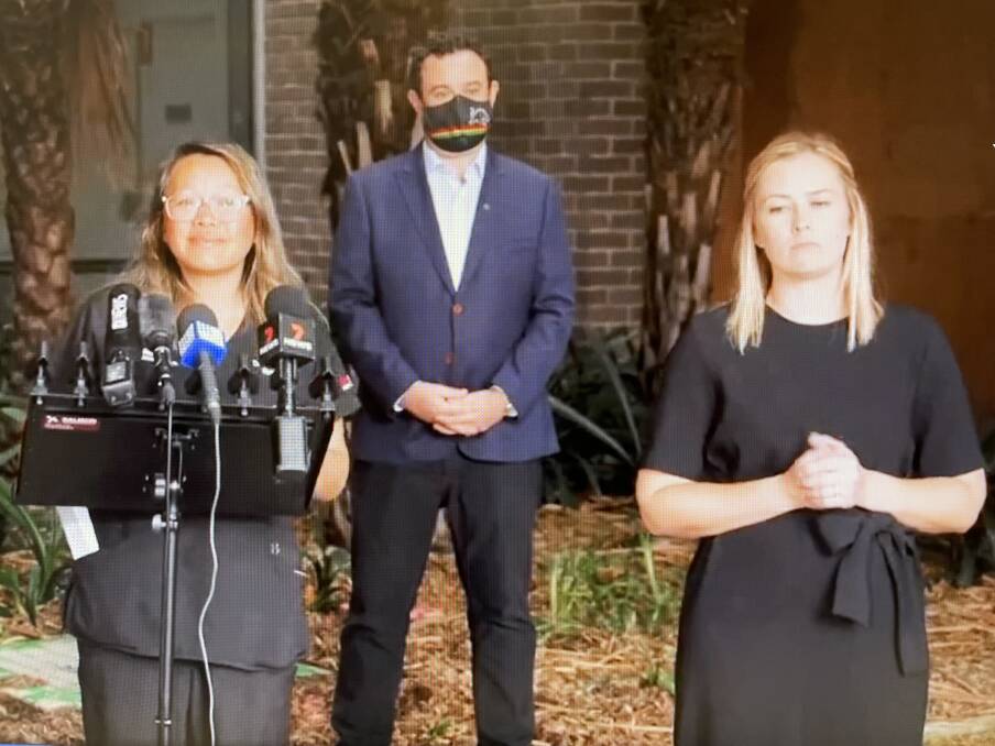 EXPLANATION: Nepean Hospital ICU specialist Dr Nhi Nguyen speaking at yesterday's COVID-19 press briefing led by Premier Dominic Perrottet. Deputy Liberal leader Paul Ayres, state member for Penrith, and an interpreter, are with her. Picture: NSW government Facebook feed