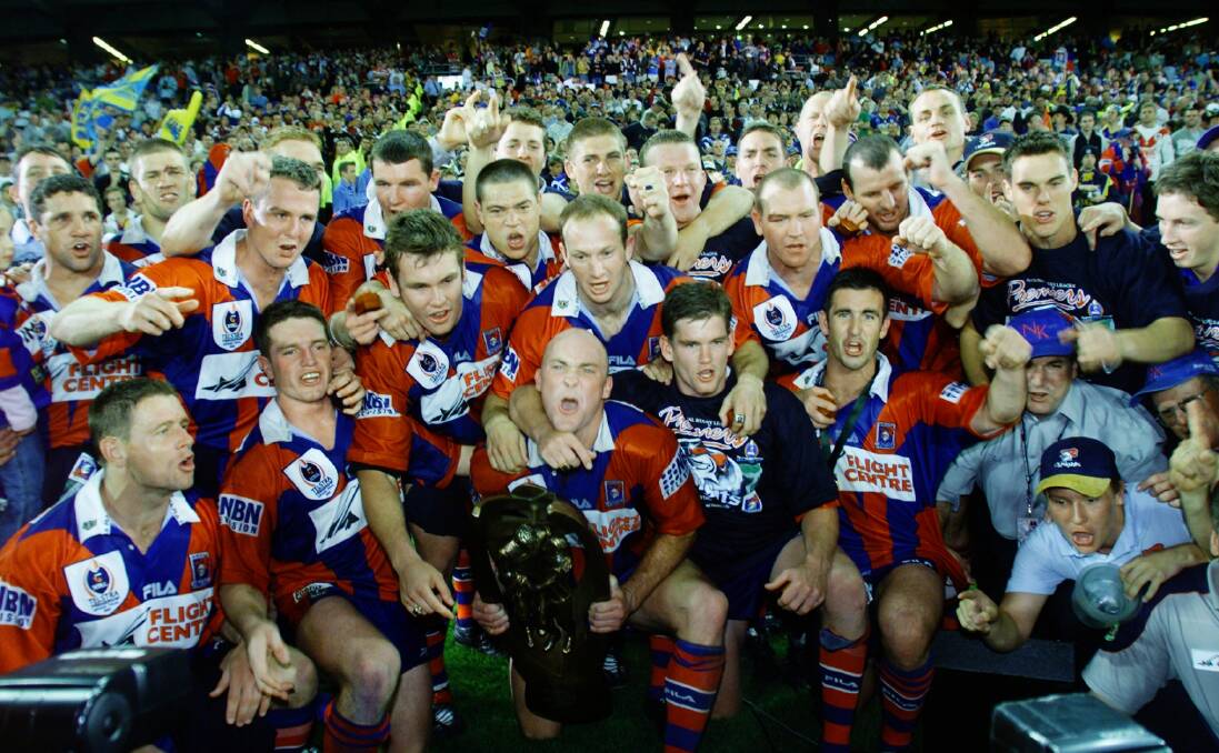 VICTORY IS SWEET: The Knights after beating Parramatta in the 2001 grand final.