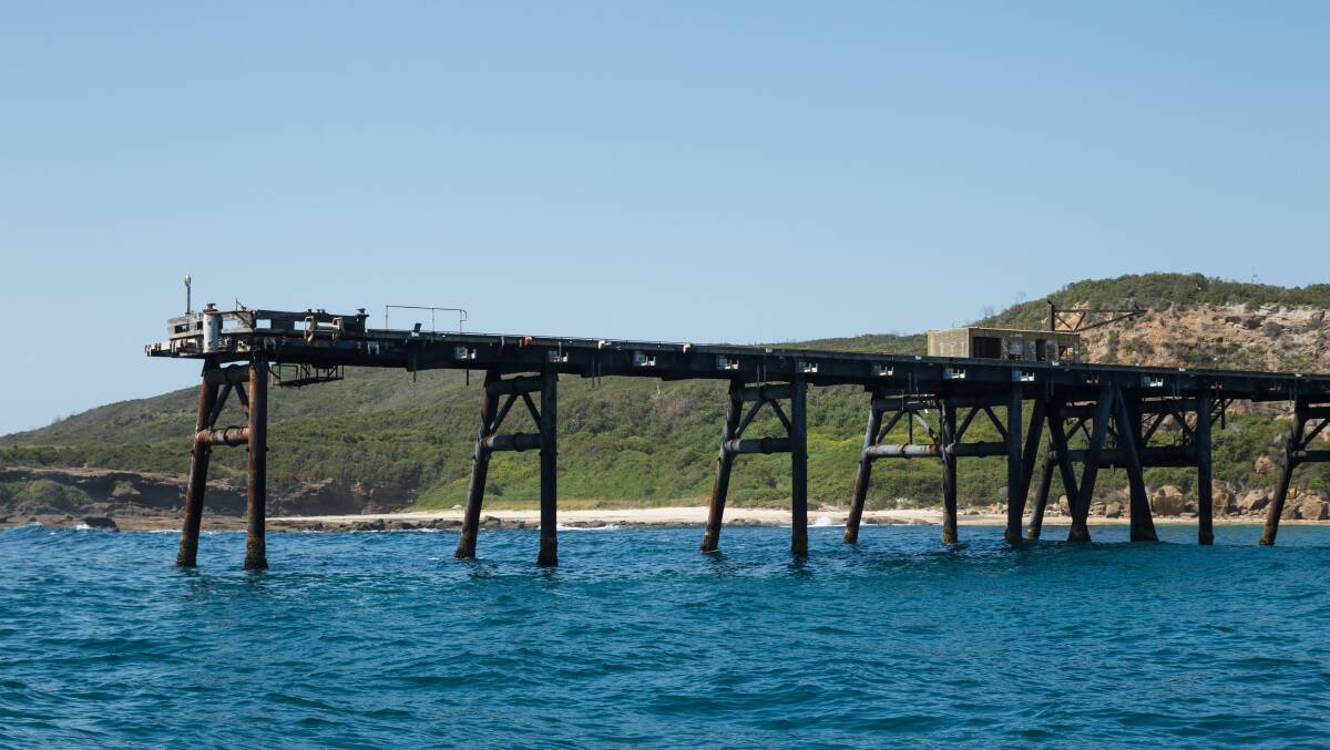 The historic coal jetty at the southern end of Catherine Hill Bay.