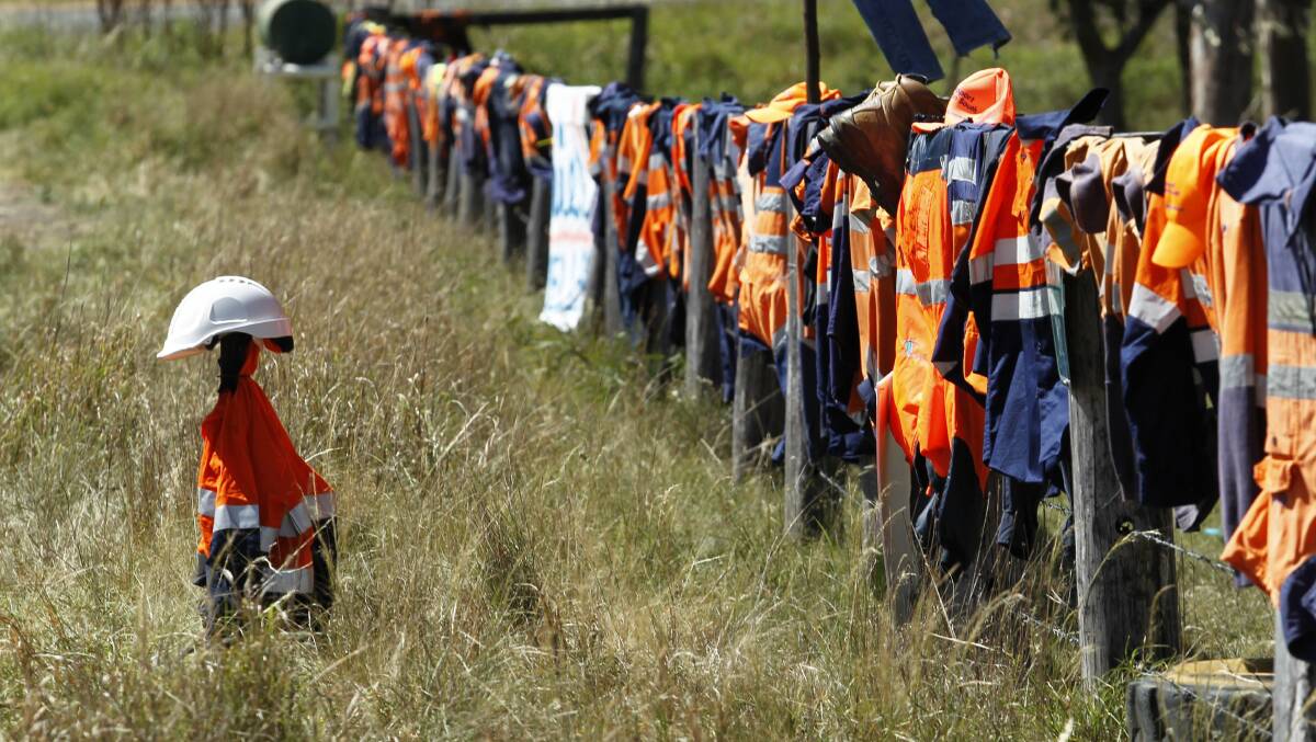 END OF THE LINE: A symbolic display of miners' clothing in late 2015 in support of the Drayton South open-cut coal project, which has again been rejected by the Planning Assessment Commission. Picture: Max Mason-Hubers.