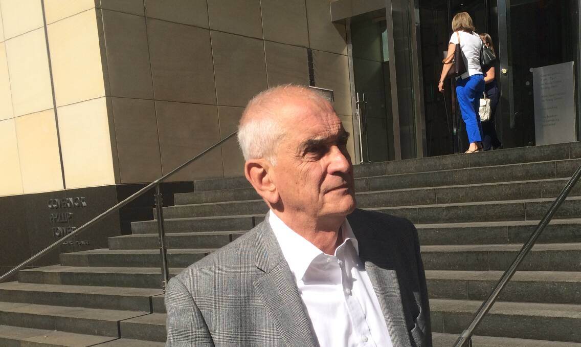 DEFIANT: The defrocked former dean of Newcastle, Graeme Lawrence, after giving evidence at the Royal Commission in Sydney on Friday. Two final days of evidence are scheduled for Wednesday and Thursday. Picture: Joanne McCarthy.