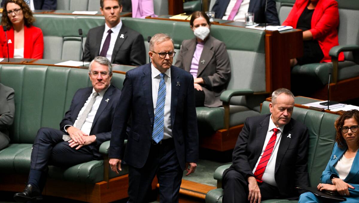 Prime Minister Anthony Albanese and members of his front bench yesterday. Labor's legislation was passed, but his pre-election promises to bring down power prices were repeatedly seized on yesterday by the opposition. Picture by Lukas Coch AAP