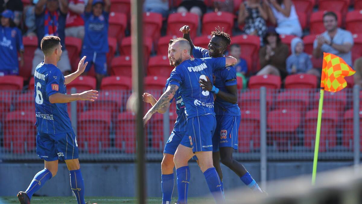 IT'S A WINNER: Jets players congratulate striker Valentino Yuel after his goal in Sunday's 1-0 win over Melbourne City. Picture: Max Mason-Hubers