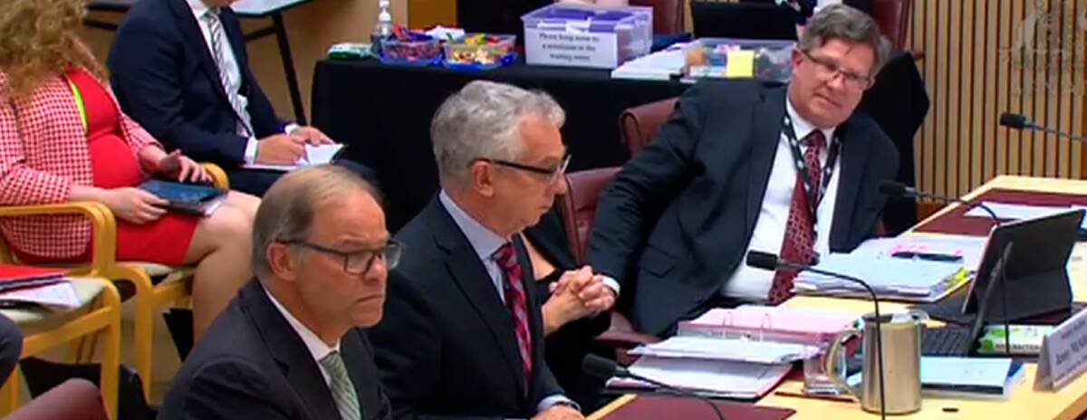 Snowy Hydro chair David Knox, interim CEO Roger Whitby, Labor Senator Jenny McAllister (obscured) and departmental secretary David Fredericks during the Snowy Hydro segment of yesterday's Budget estimates committee hearing.