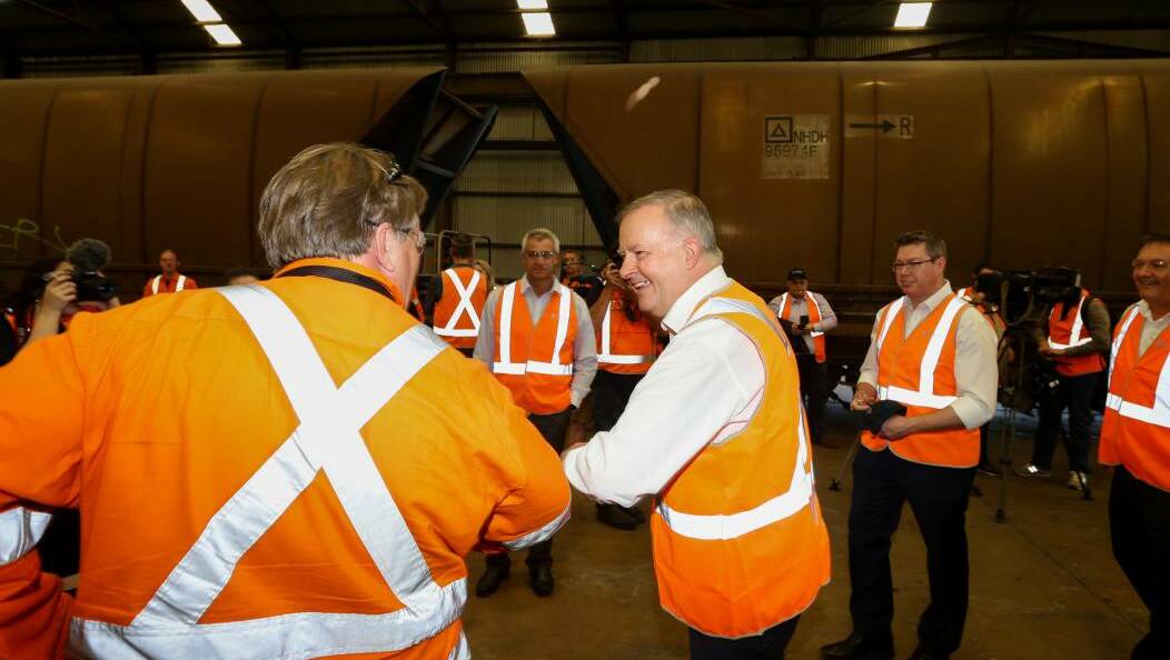 RETURN VISIT: Anthony Albanese at Varley Group in Carrington last month, with Shortland MP Pat Conroy to his right. Picture: Jonathan Carroll