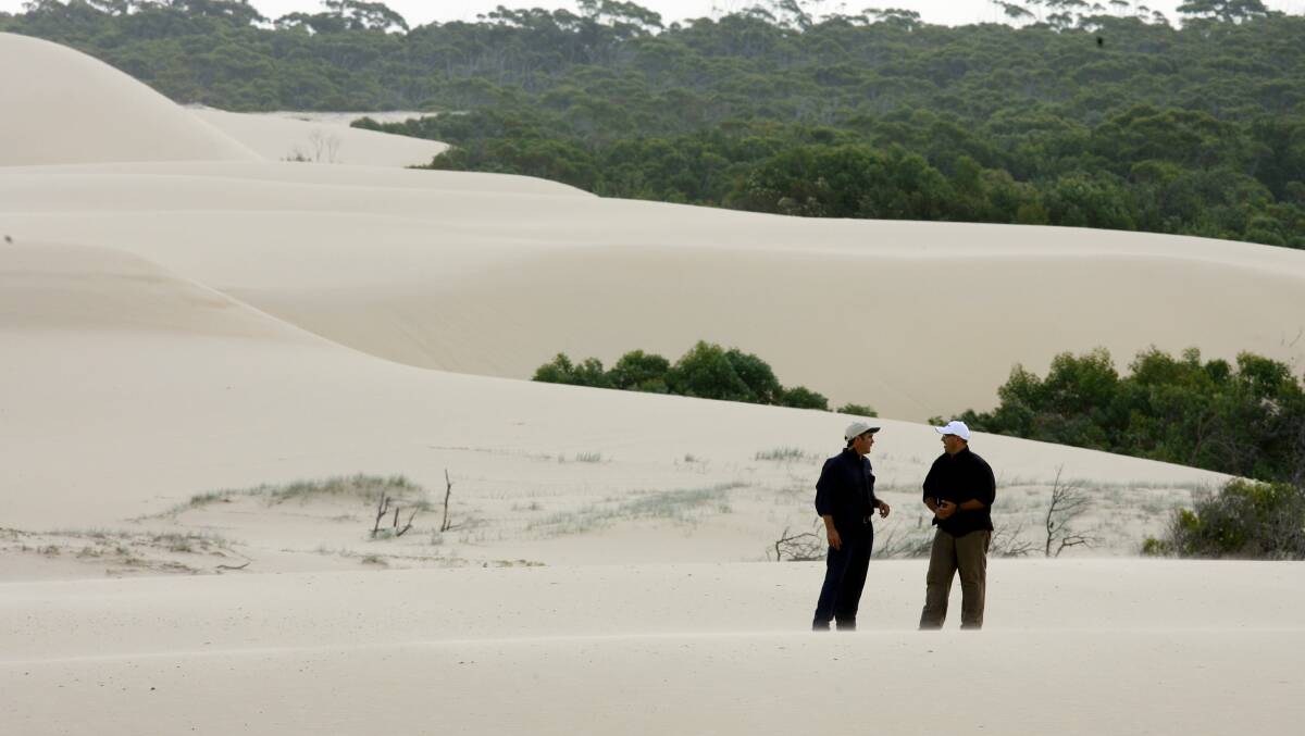 BY THE BUCKETFUL: Sand everywhere. Worimi lands, 2008. Picture: Darren Pateman