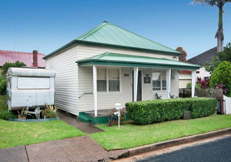 SAME HOUSE: The Mayfield property pictured above, as it was when marketed in 2013.
