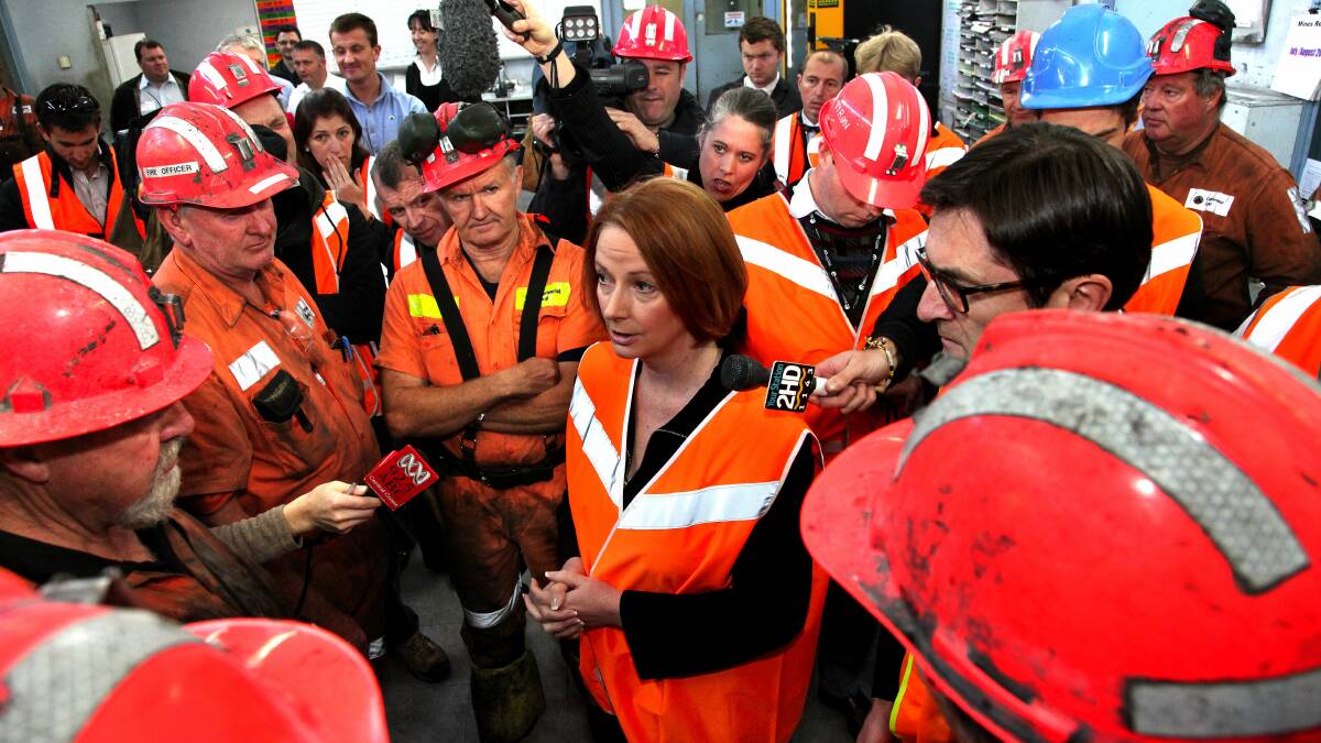 HAPPIER TIMES: Then prime minister Julia Gillard and climate change minister Greg Combet meet the crew at Mandalong mine. Picture: Phil Hearne