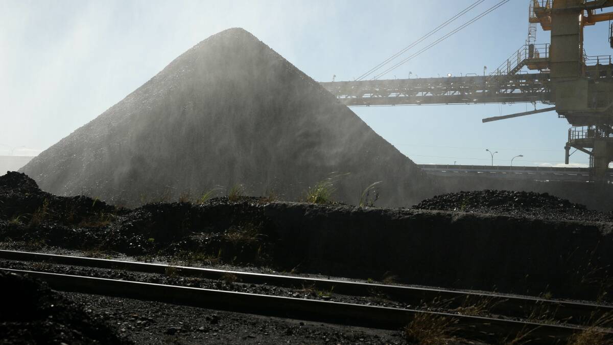 A PWCS coal stockpile on Kooragang Island. Picture by Jonathan Carroll