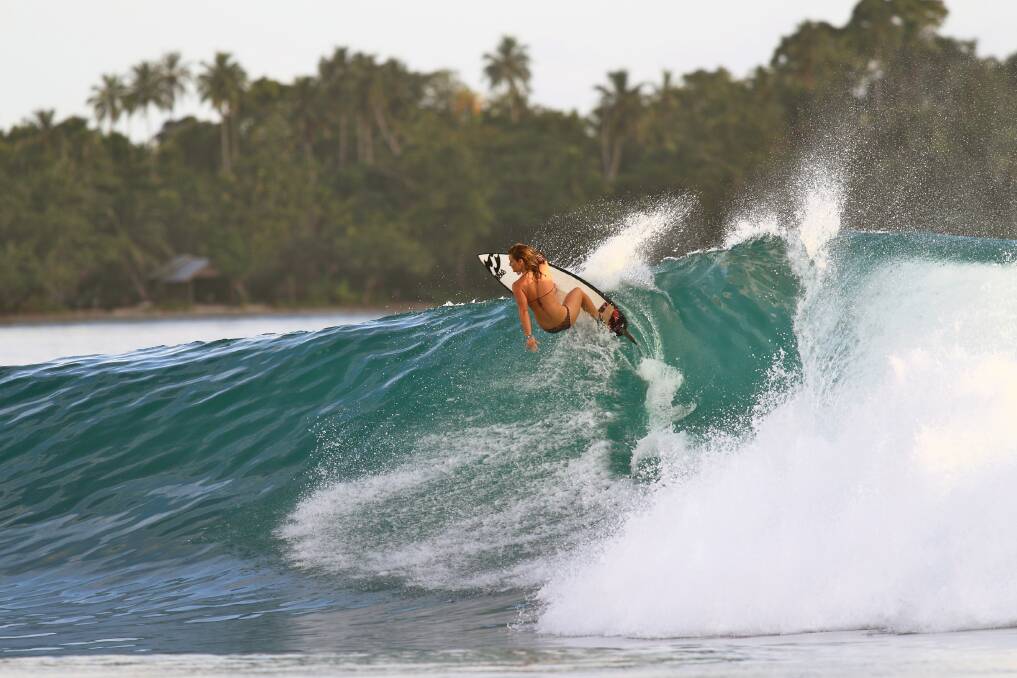 Bec Woods competing in Association of Surfing Professionals world tour events, free surfing in Indonesia, and in Newcastle last week