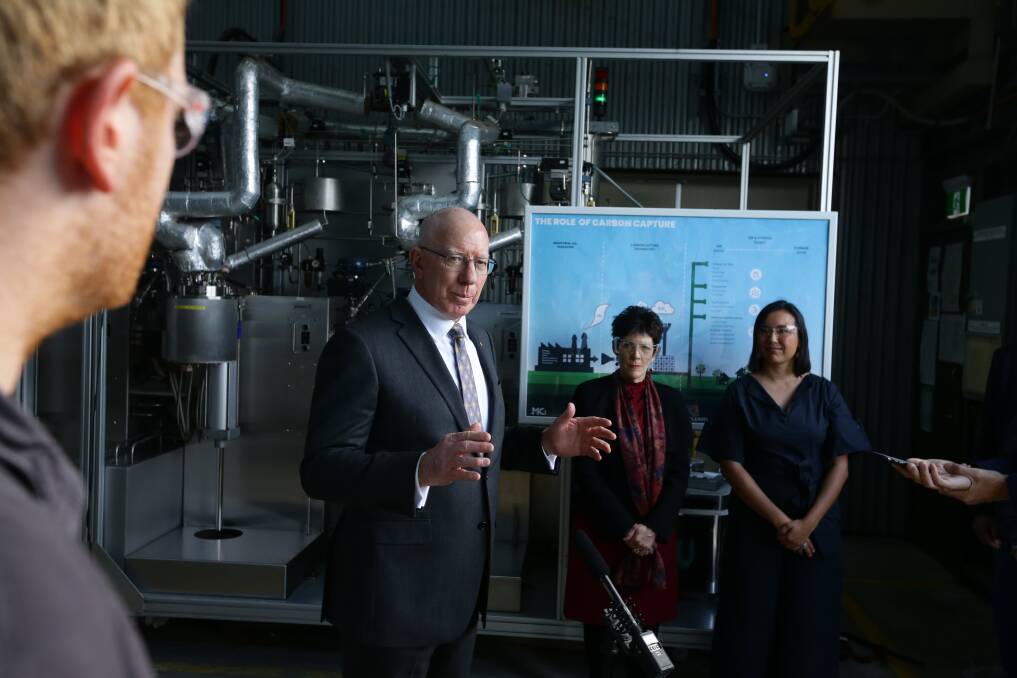 BIG IDEAS: Governor-General David Hurley congratulating the MCi team at their Shortland facility yesterday. With him are his wife, Linda, and Sophia Hamblin Wang and Jason Mann from MCi. Picture: Jonathan Carroll