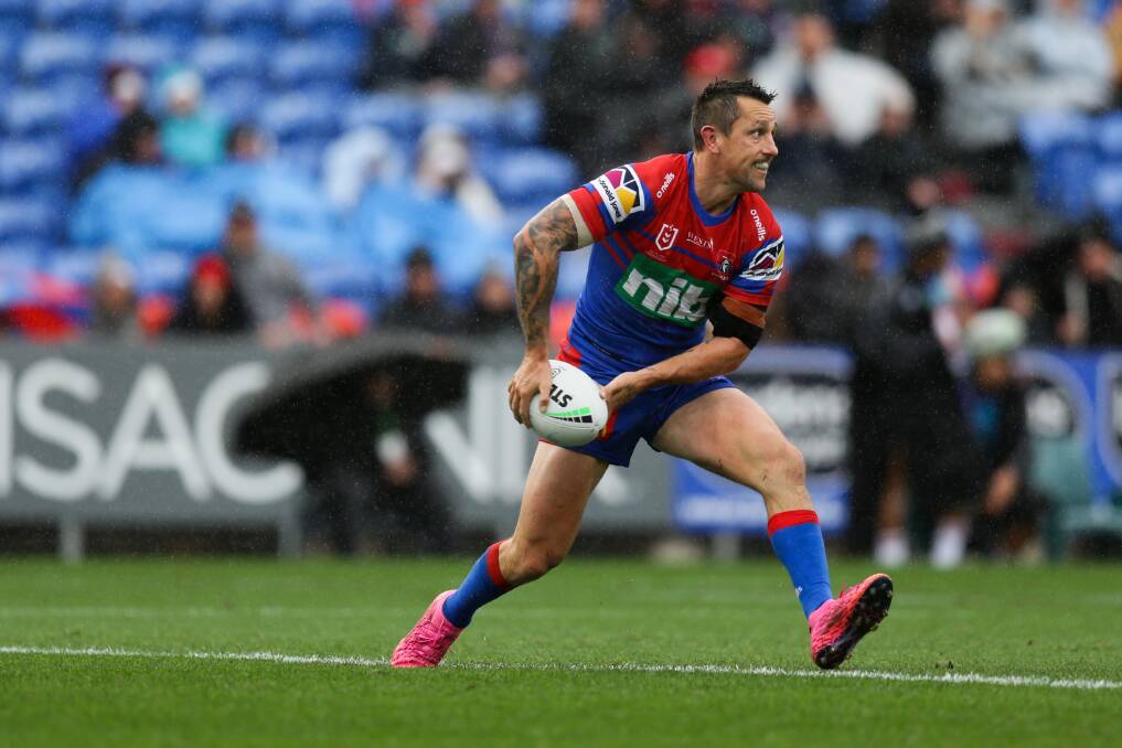 EYES UP: Knights halfback Mitchell Pearce in one of the team's rare home games this year.