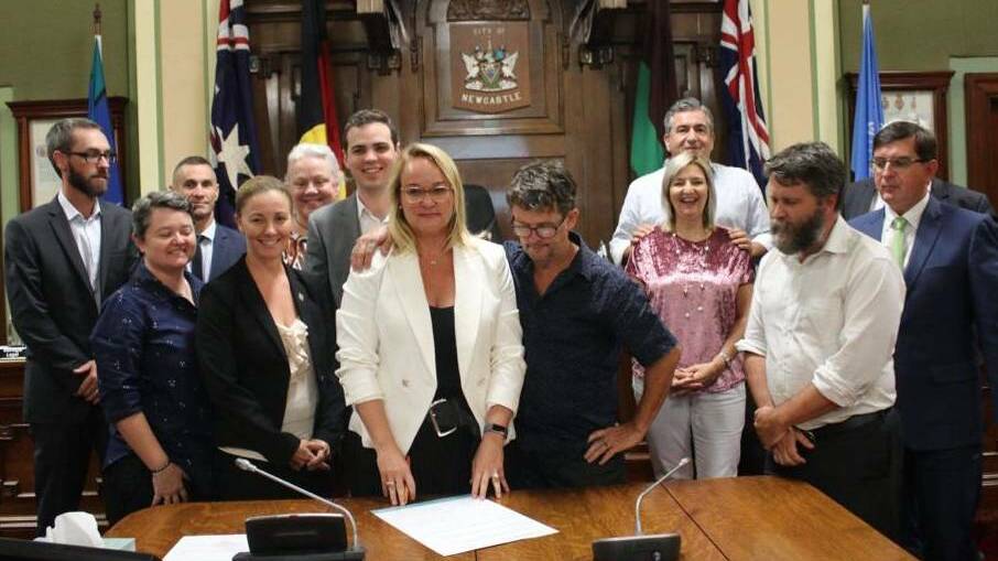 FURTHER CONTROVERSY: Cr Robinson with his arm over Lord Mayor Nuatali Nelmes from the Herald in February last year.