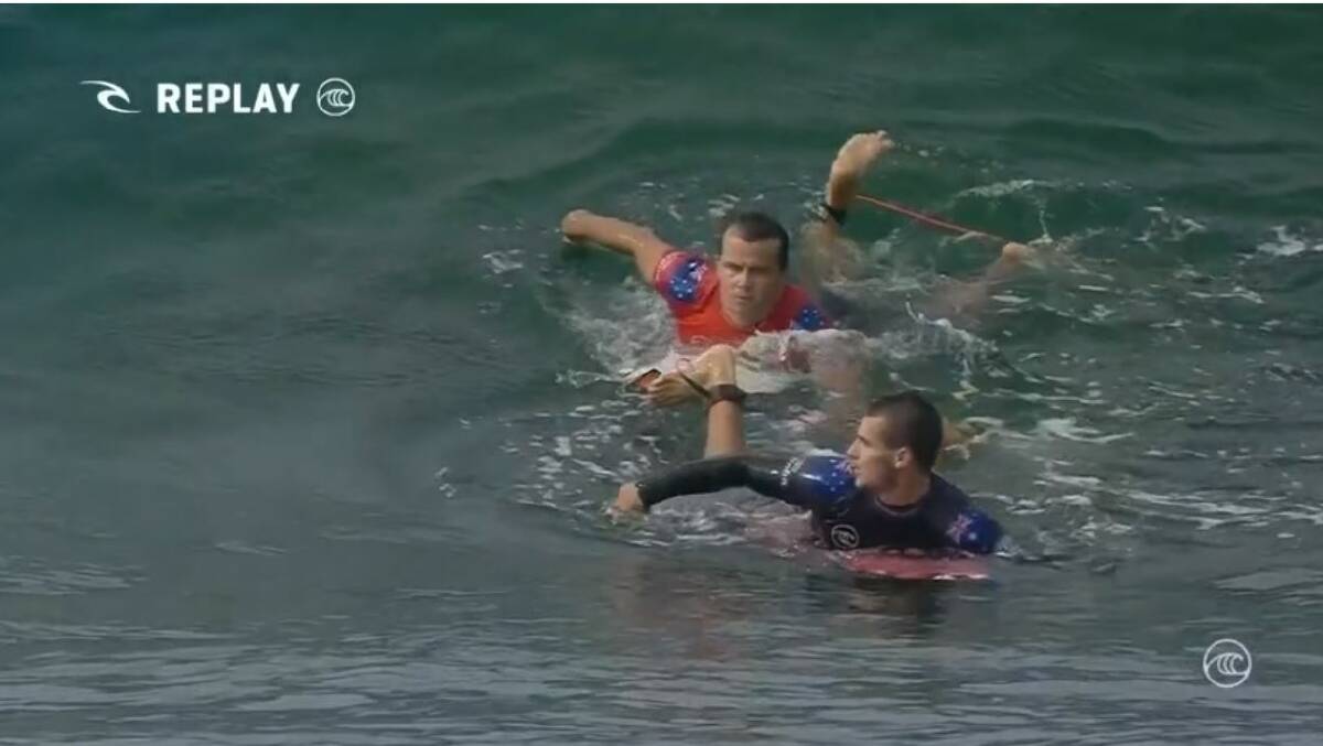 Julian Wilson and Jack Robinson in an interference call that cost Robinson one of his waves.
