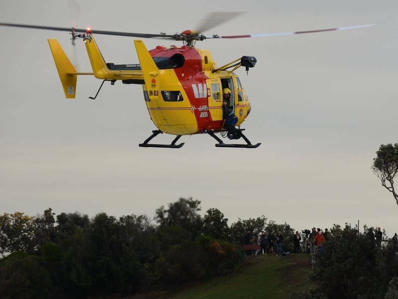  SEARCH MISSION: The Westpac rescue helicopter at Port Kembla during the emergency on Friday.
