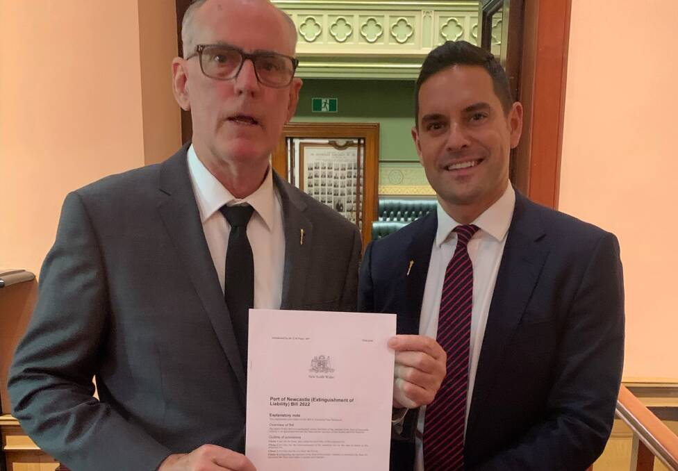 Greg Piper, holding a copy of the Port of Newcastle (Extinguishment of Liability) Bill 2022, with fellow Independent Alex Greenwich, MP for Sydney. Picture from office of Greg Piper
