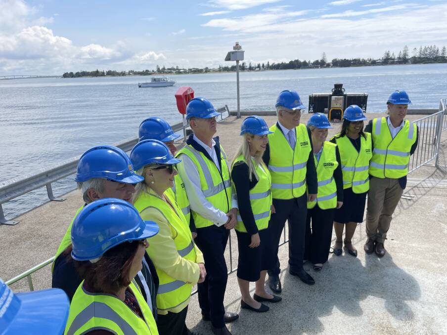 Mr Morrison fourth from right with Port of Newcastle chief executive Craig Carmody to his right, together with others involved in the port announcement.
