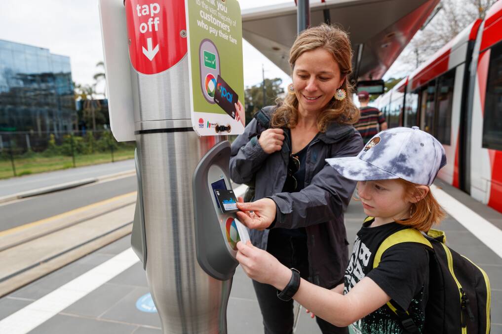 TIME FOR CHANGE: Jade Mifsud, with son Brody yesterday, says charging $3.20 for one stop on the light rail is wrong. Picture: Max Mason-Hubers