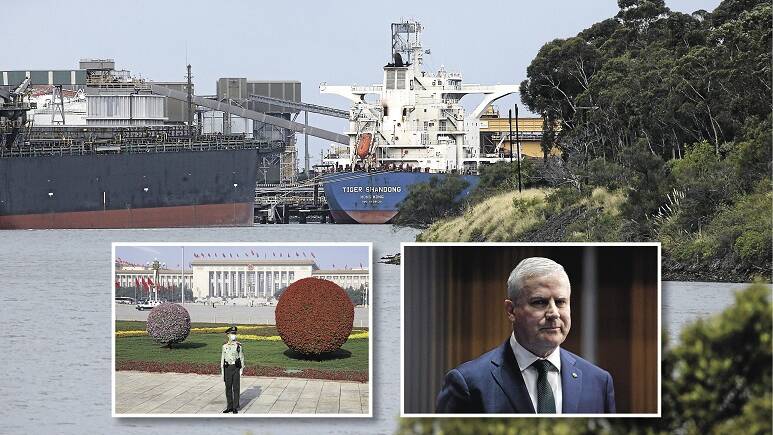 DIPLOMATIC ROW: The Hunter coal industry could be heavily affected. Insets show a guard outside the National People's Congress at the Great Hall Of The People in Beijing yesterday and Deputy PM Michael McCormack. Main: The Tiger Shandong loading coal yesterday. Picture: Simone De Peak